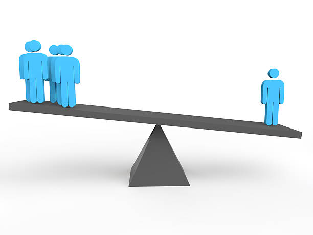 istock 3d person is heavier on a seesaw 501204676