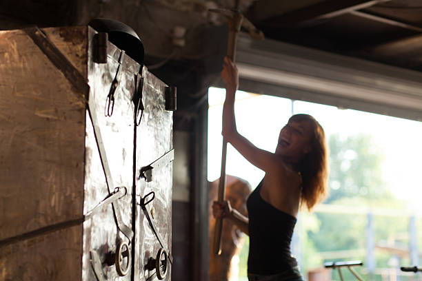 istock beautiful young woman holding pickax 501204932