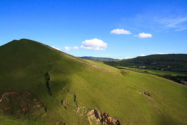 istock Countryside Idyll: Lush, Soft, Treeless Green Hills in Morning Light 501205001