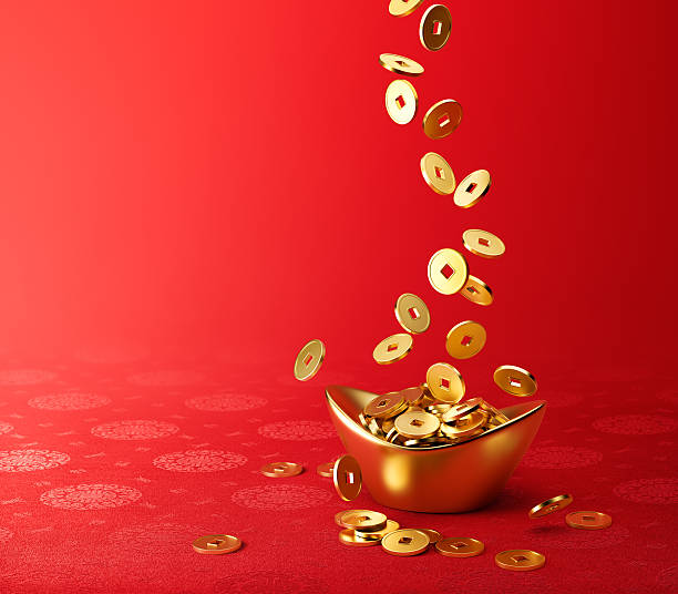 Gold Coins Dropping on Gold Sycee - Yuanbao Gold coins dropping on gold sycee ( yuanbao ) - red Chinese fabric with oriental motifs background chinese yuan coin stock pictures, royalty-free photos & images