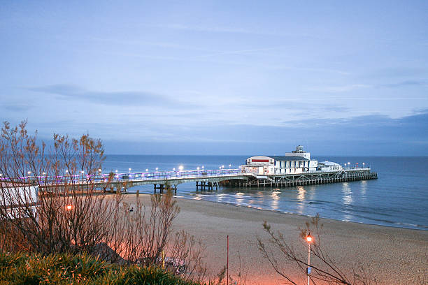 Bournemouth Pier Bournemouth Pier at Twilight, Dorset bournemouth england photos stock pictures, royalty-free photos & images
