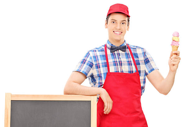 istock Ice cream vendor standing by a blackboard 501206573