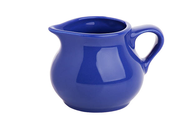 istock Small elegant clay jug of milk 501206813
