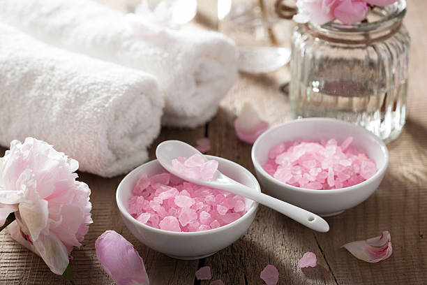 istock spa set with peony flowers and pink herbal salt 501208477