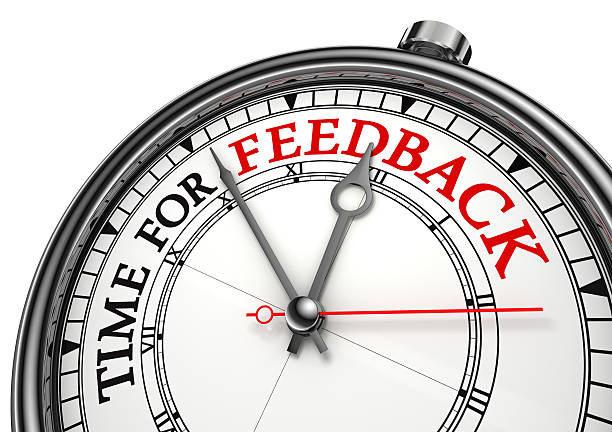 time for feedback concept clock stock photo