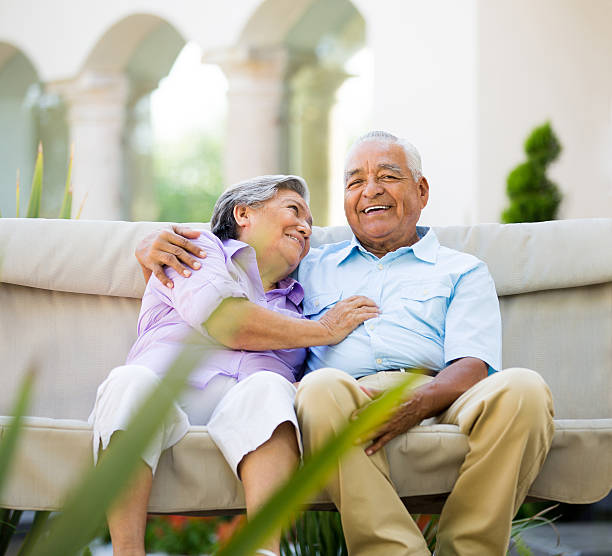 istock Latin senior couple talking on porch 501210867