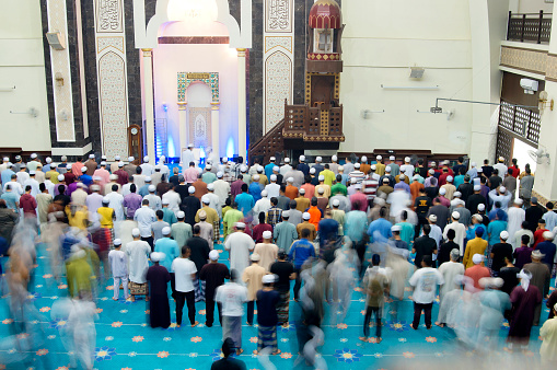 Muslim gathered to perform shalat Isya before tarawih prayer