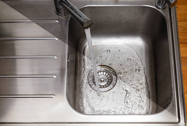 istock Dirty and cleaned to shine sink in the kitchen 501219244