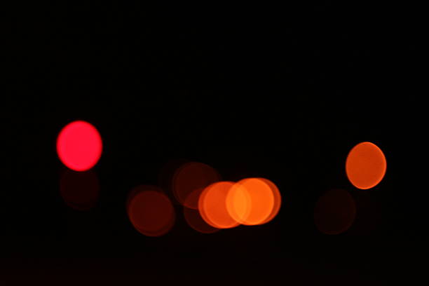 abstract blur bokeh de noche tráfico en calle de la ciudad. - land vehicle multiple lane highway driving traffic fotografías e imágenes de stock