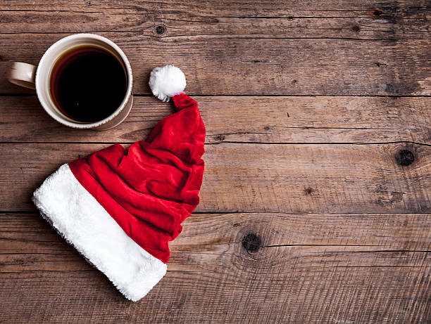 istock Cup of coffee and Santas hat 501226100