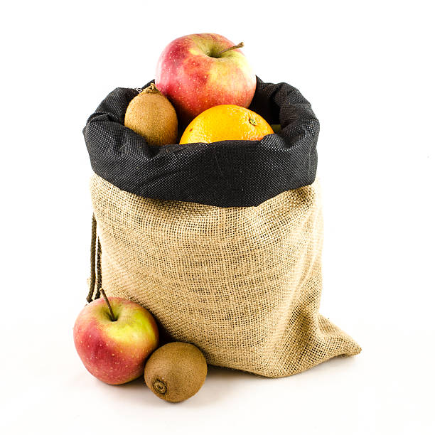 jute tasche mit früchten - burlap fruit apple freshness stock-fotos und bilder