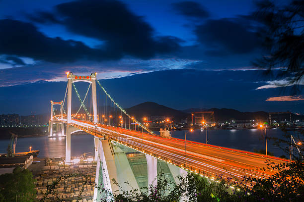 istock xiamen haicang bridge at dusk 501227124