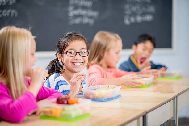 istock Children Happily Eating Healthy Snacks 501228786