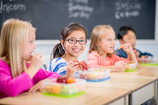 istock Enjoying a Healthy Snack at School 501229164