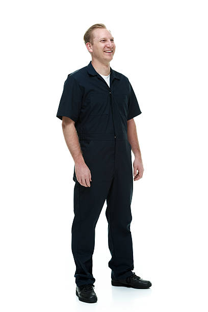 istock Smiling mechanic standing and looking away 501230336