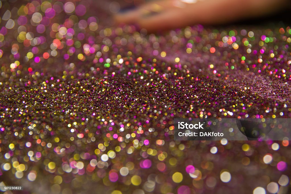 Colorful tinsel sprinkled on the surface the table Abstract Stock Photo