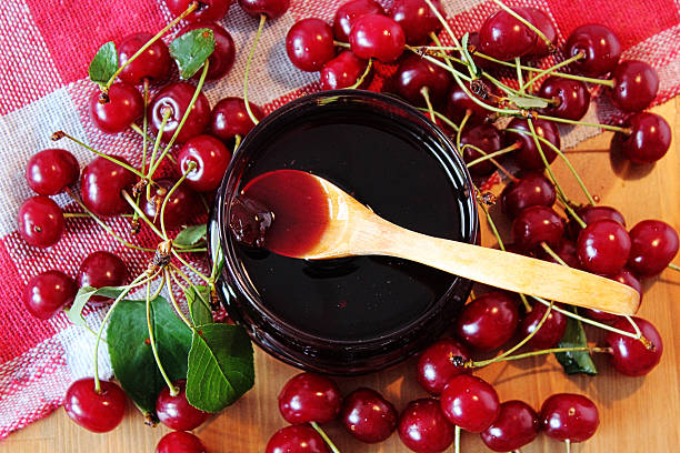 Cherries and cherry jam stock photo