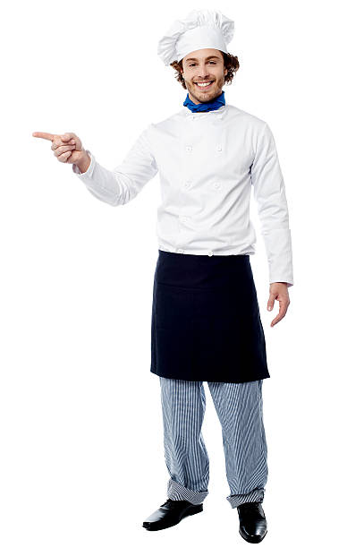 istock Young male chef pointing to a product 501236079