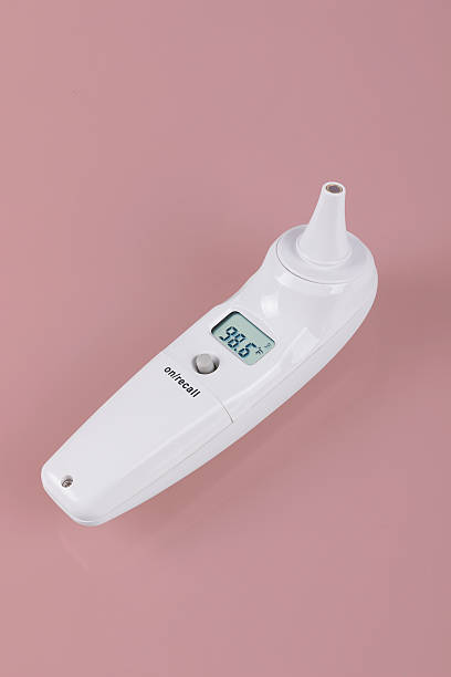 Ear infrared thermometer stock photo