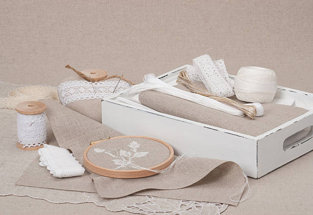 istock Sewing And Embroidery Craft Kit. Natural Linen Background 501238427