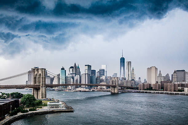 istock dark clouds over Brooklyn bridge and manhattan 501240155