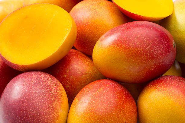 Mangoes Mangoes composition (fullframe) mango fruit photos stock pictures, royalty-free photos & images