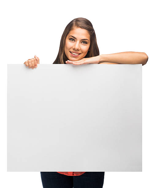 istock Young latin woman posing with sign 501240299
