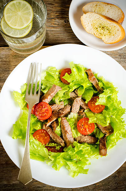 istock green salad with tomatoes and roast beef 501240451