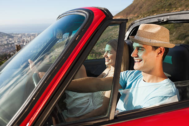 istock Smiling couple on their way to the beach 501243401