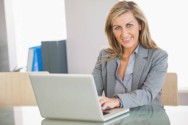 istock Businesswoman using a laptop in an office 501243829