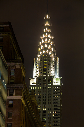 New York Skyscraper illuminated at night in Manhattan