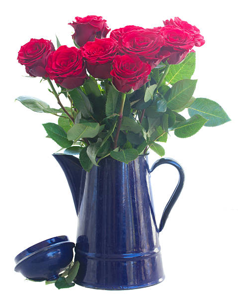 istock red roses in blue pot 501253870