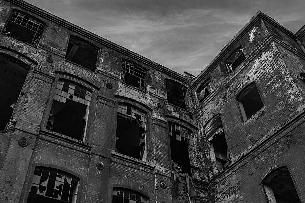istock Ruined old textile factory in black and white, B&W. 501255540