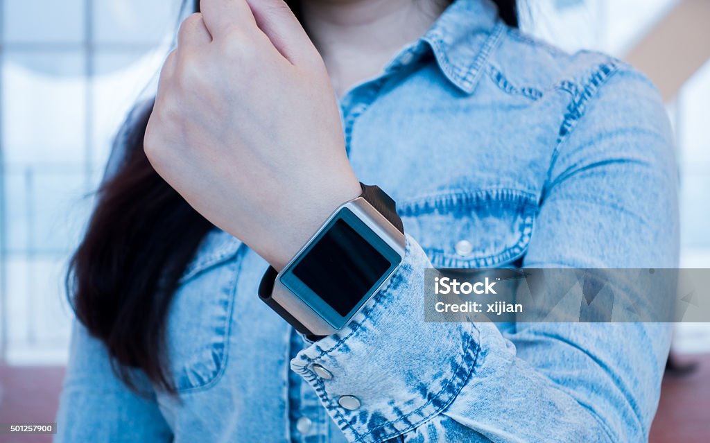 Hand serving smart watch 2015 Stock Photo