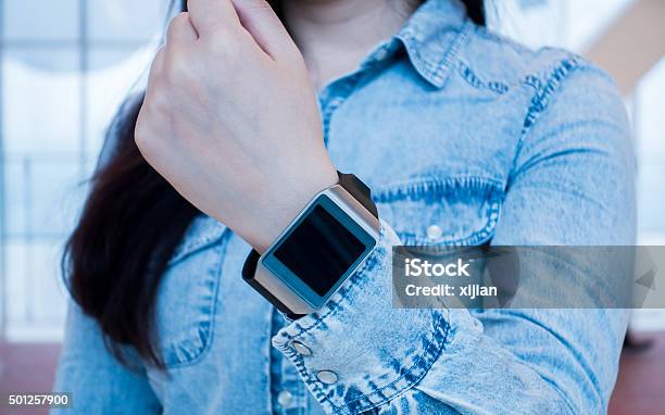 Hand Serving Smart Watch Stock Photo - Download Image Now - 2015, Adult, Arts Culture and Entertainment