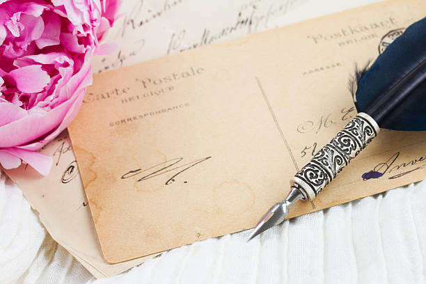 istock quill pen and antique letters 501258146