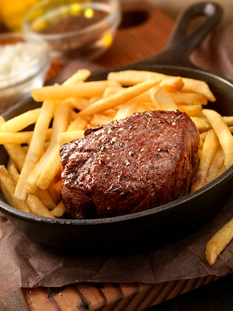 Steak Fillet Seasoned with Sea Salt, Fresh Cracked Pepper and hand Cut Fries -Photographed on Hasselblad H3D2-39mb Camera