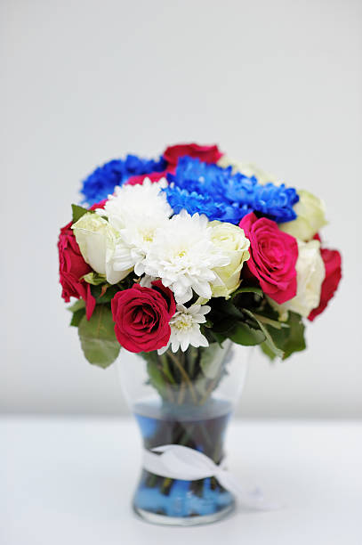 Free Stock Photo of White Vase Filled With Red and Blue Flowers ...