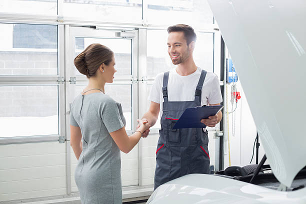 istock maintenance engineer shaking hands with female customer 501260907