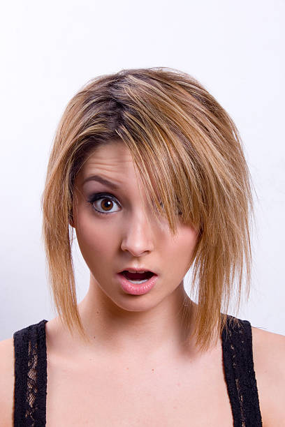 istock Young blonde woman looking surprised 501263415