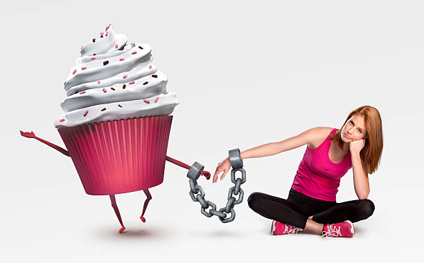 istock Woman handcuffed to a cupcake 501263517