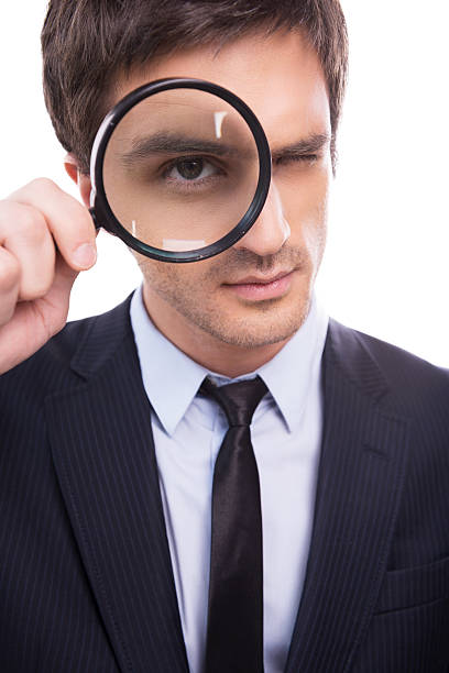 istock Businessman examining you. 501263561