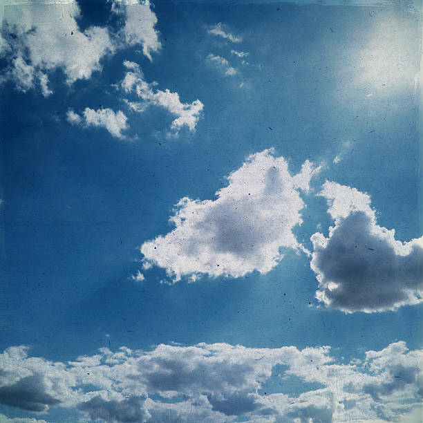 istock old paper with white clouds on the blue sky texture 501264523