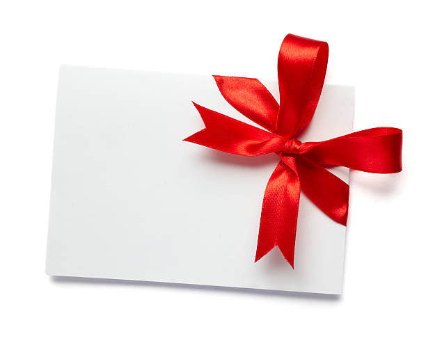 istock Note card with red ribbon isolated on white 501264609