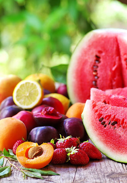 istock fresh fruits on wooden table 501264951