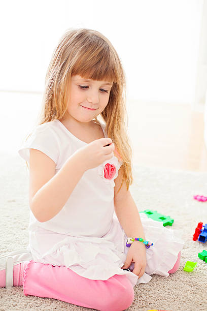 istock Little girl  playing alone 501265519