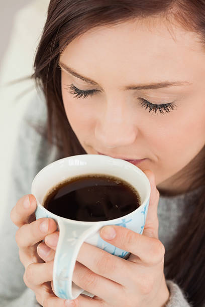 istock Relaxed girl drinking a cup of coffee 501276501