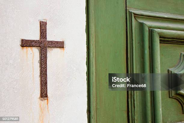 Iron Cross Snuggled In Stone Stock Photo - Download Image Now - Catholicism, Christianity, Church