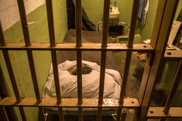 Prison cell on Alcatraz Island, San Francisco Prison cell on Alcatraz Island, San Francisco, USA alcatraz island stock pictures, royalty-free photos & images