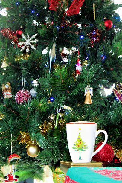 istock Christmas Tree with a Christmas Cup of coffee 501282042
